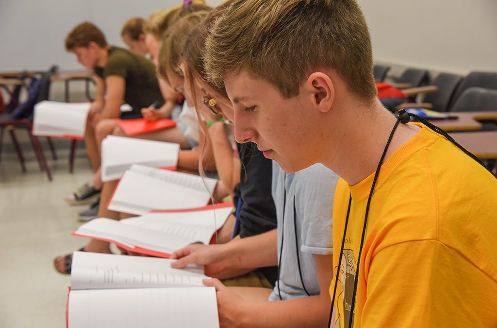 Switching parts, practicing speed-throughs, and confirming your understanding of each line aids in long-term memorization.