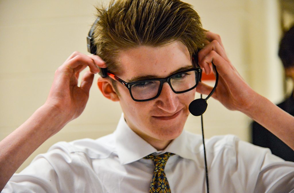 Theatre student wearing headset