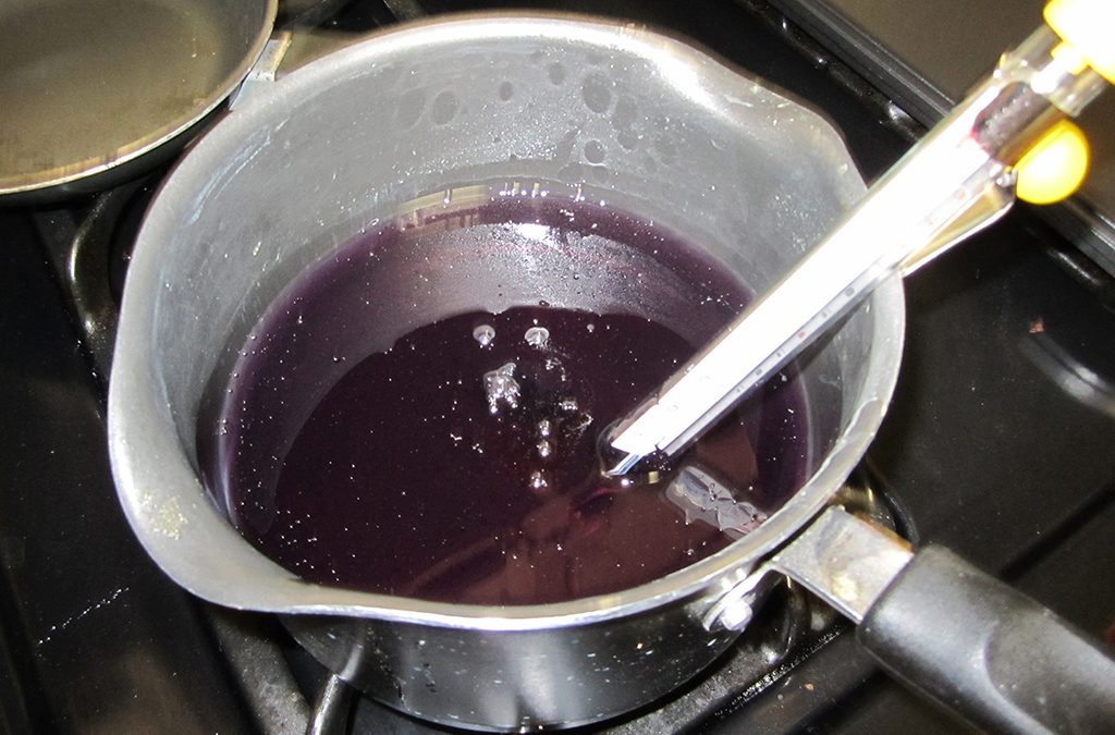 Use a thermometer to monitor the temperature of the melting wax.