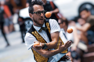Acting Resume - white man juggling oranges