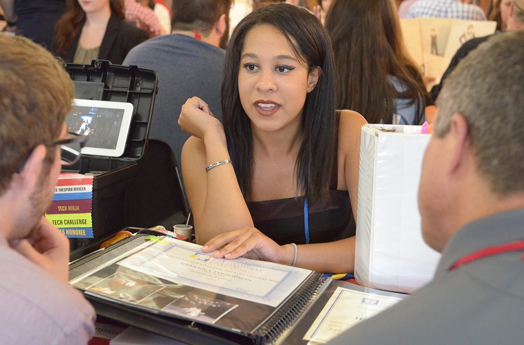 A student participates in the technical theatre challenge at the International Thespian Festival.