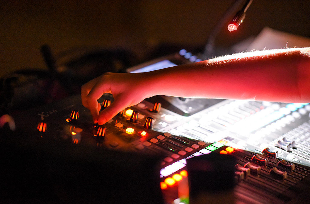 A Thespian operates the light board during the Garden City (Kan.) High School International Thespian Festival production of Hamlet.