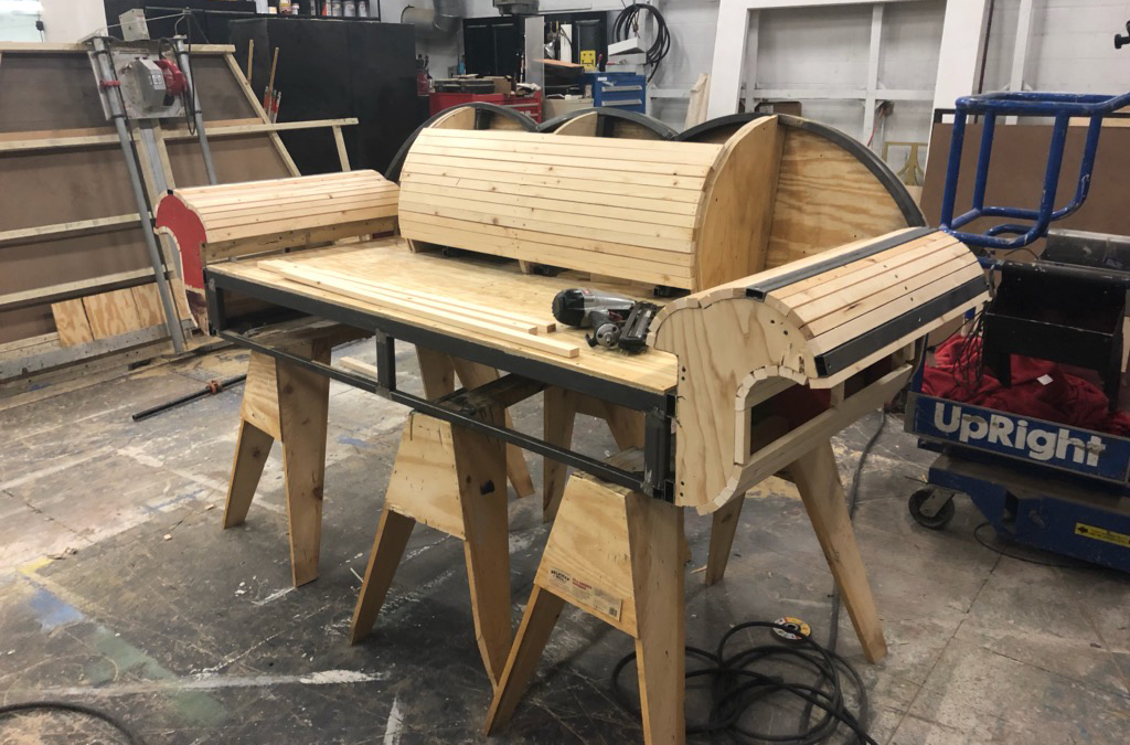 The author built this period couch from scratch to allow for unusual wear and tear onstage.