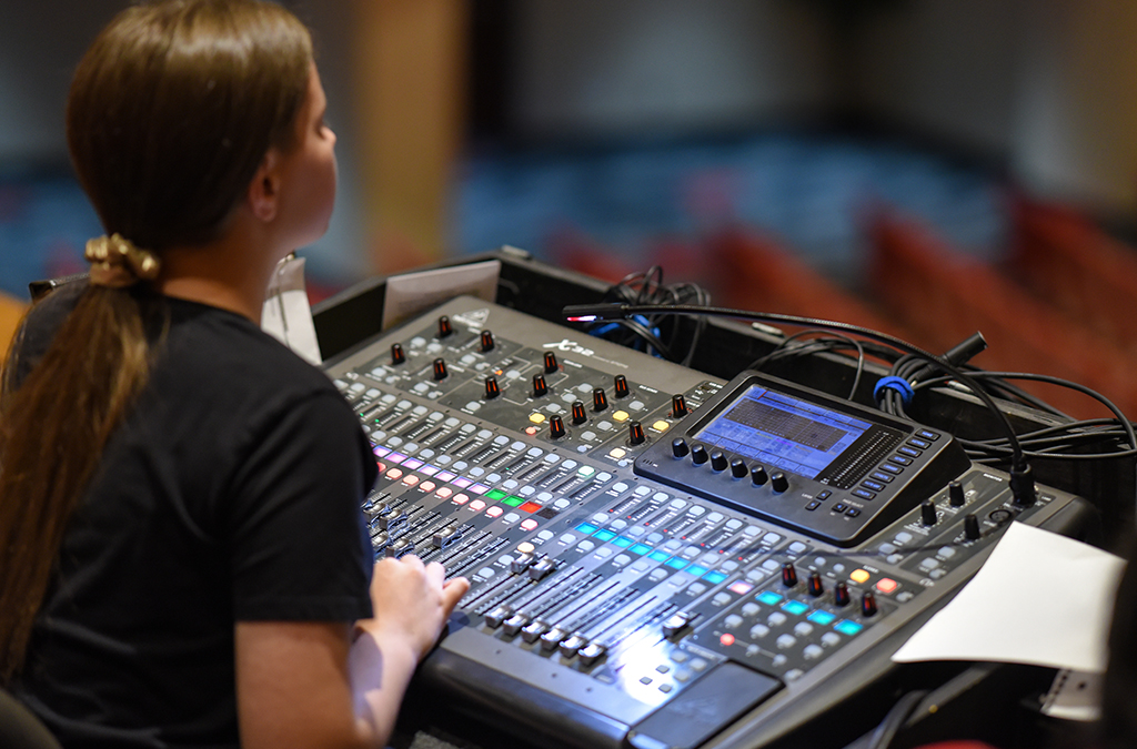A board operator preps for Garden City (Kan.) High School’s performance of Hamlet.