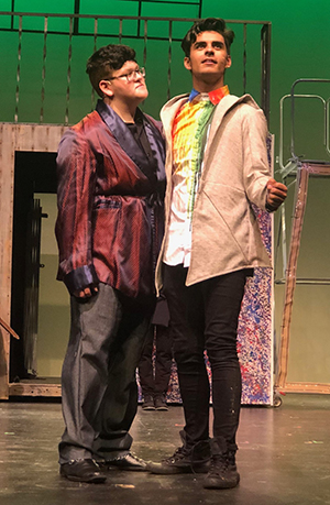 Johb Silva as Claudius and Nathan Ayala in the title role of Garden City High School's production of Hamlet.