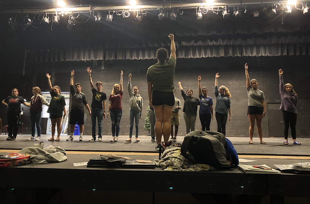 Sophia Hillman oversees a dance rehearsal as the director of Elf.