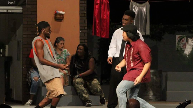 Students performing In The Heights (2016) at Foster High School.