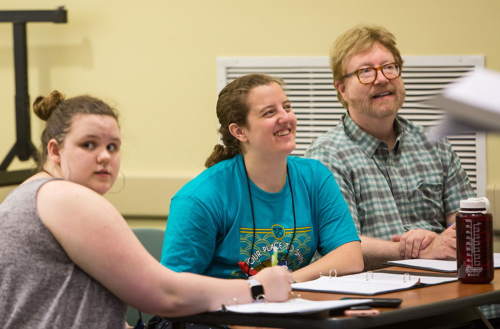 Gabi Garcia (center, with stage manager Lauren Porter and dramaturg Mark D. Kaufmann) in rehearsal for Ismene at the 2019 International Thespian Festival.