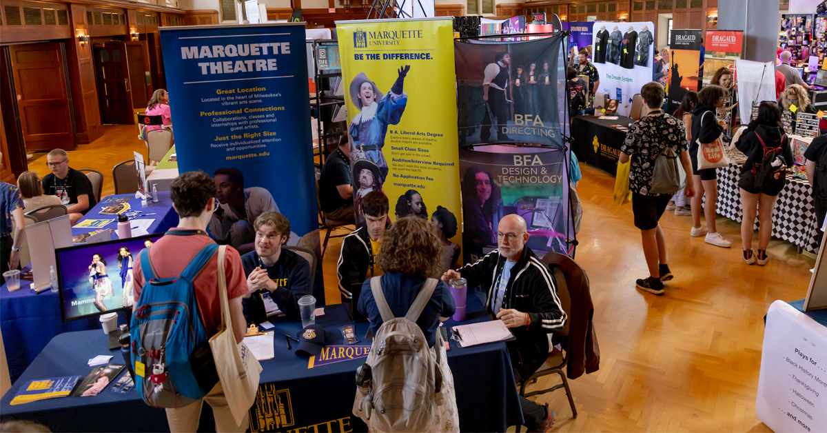 Students getting information from colleges at the ITF exhibit hall