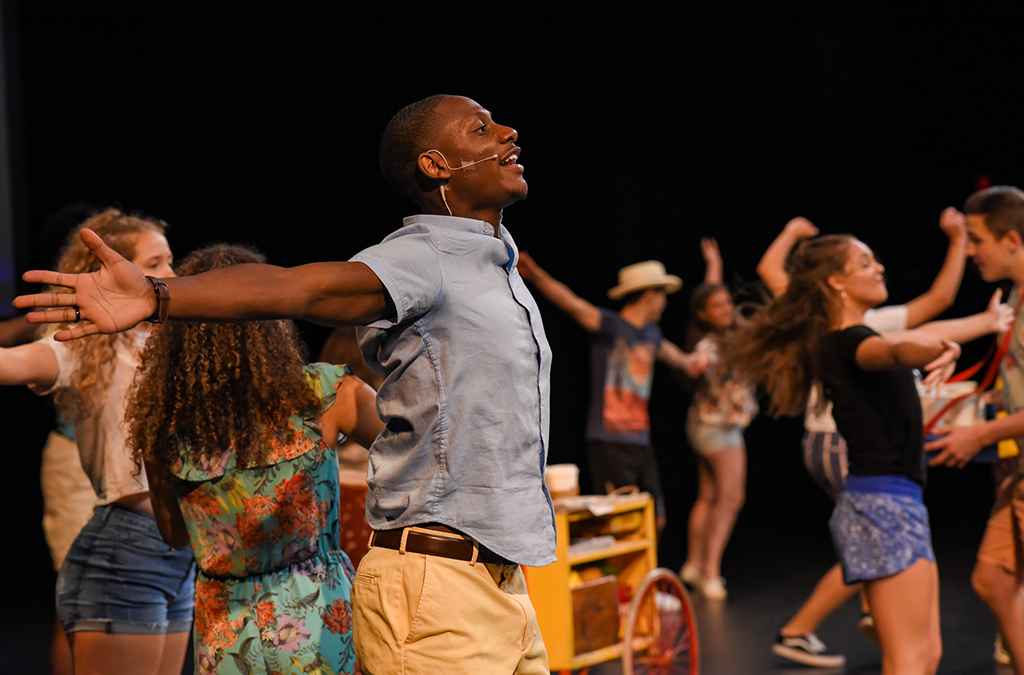Student performers rehearse for the International Thespian Festival opening show.