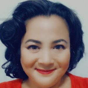 Young woman with black hair and red shirt