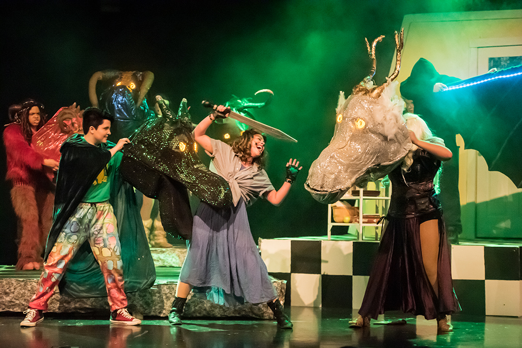 Livy Potthoff (center) and the cast of St. Charles High School’s production of She Kills Monsters.