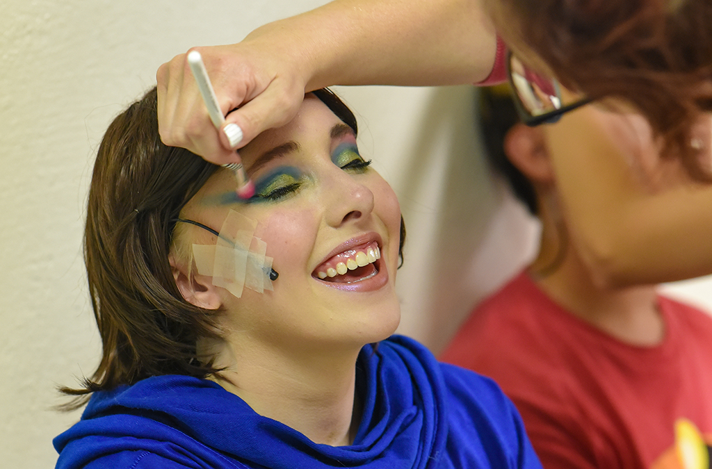 Cast members of St. Charles (Mo.) High School’s production of She Kills Monsters undergo final makeup application.