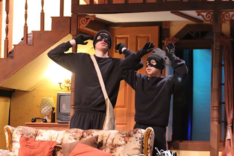 Daric Souder and Terry Ta in McPherson High School's production of Noises Off.