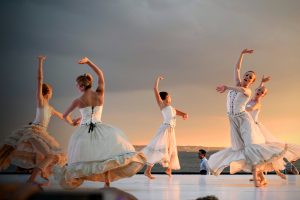 dancers in white dresses