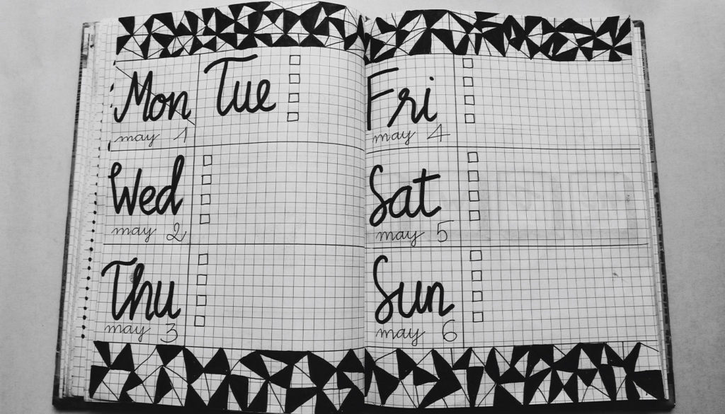 black and white photo of a weekly planner