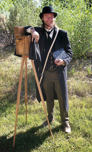 Mica Pointer as an 1890s cameraman during Bannack Days weekend of living history at Montana State Parks.