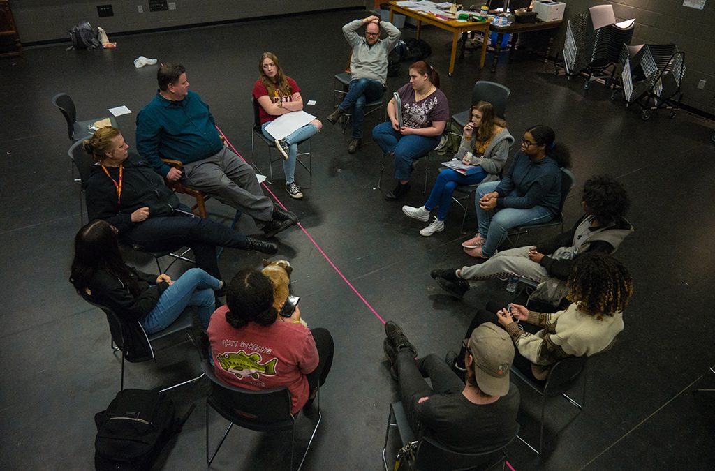Thespian technicians participate in a full production meeting.