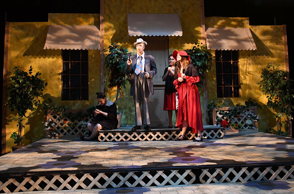 Hannah Hiszczynskyj, Tyler Tiede, Trinity Abril, and Lauren Harmon in the Hayden Catholic High School (Topeka, Kansas) production of The Taming of the Shrew.