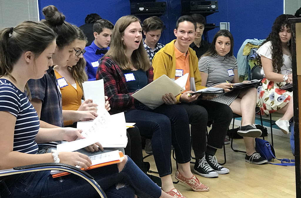 Lydia Brown (center) rehearses her solo in "You Can't Stop the Beat."
