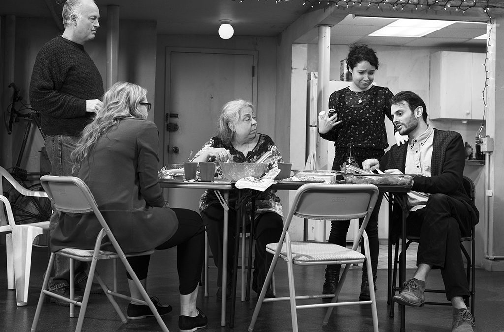 Jayne Houdyshell (seated at center) with Reed Birney, Cassie Beck, Sarah Steele, and Arian Moayed in the Broadway production of The Humans.