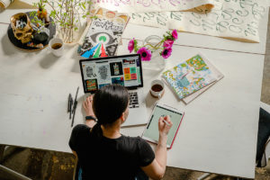 Theatre Careers working from a desk