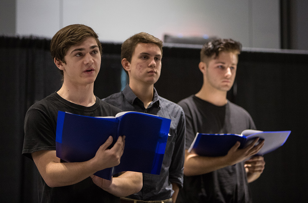 John Eddy, Shane Howell, and Parker Medley perform in the 2018 International Thespian Festival staged reading of Umtya.