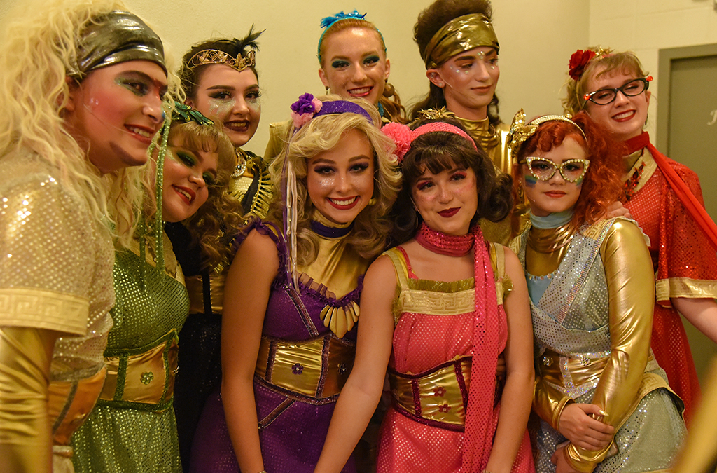 The cast of Arab (Ala.) High School’s production of Xanadu enjoy a quiet moment before their show.